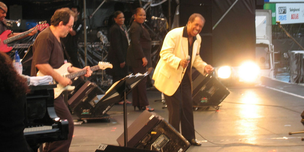 Al performing with Ben E. King